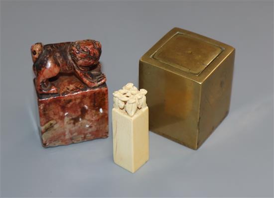 A Chinese bronze seal, a soapstone seal and ivory seal